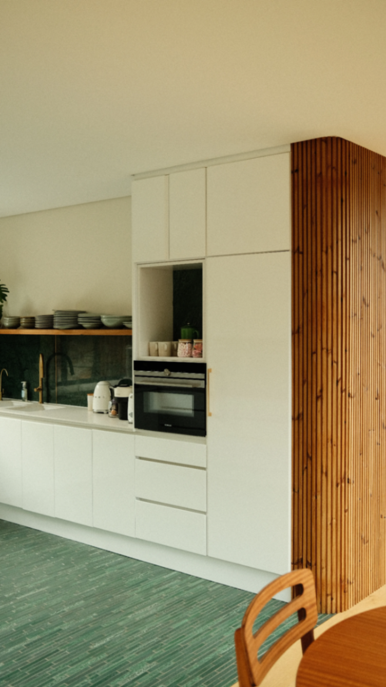 Kitchen millwork, sage tile and oak batten wrap