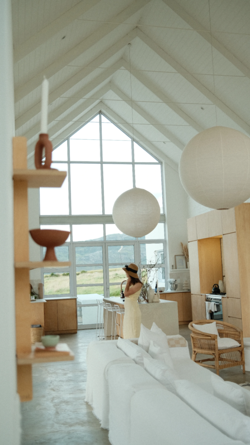Cathedral ceiling and paper lanterns over the kitchen